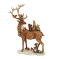 Cerf avec de nombreux animaux