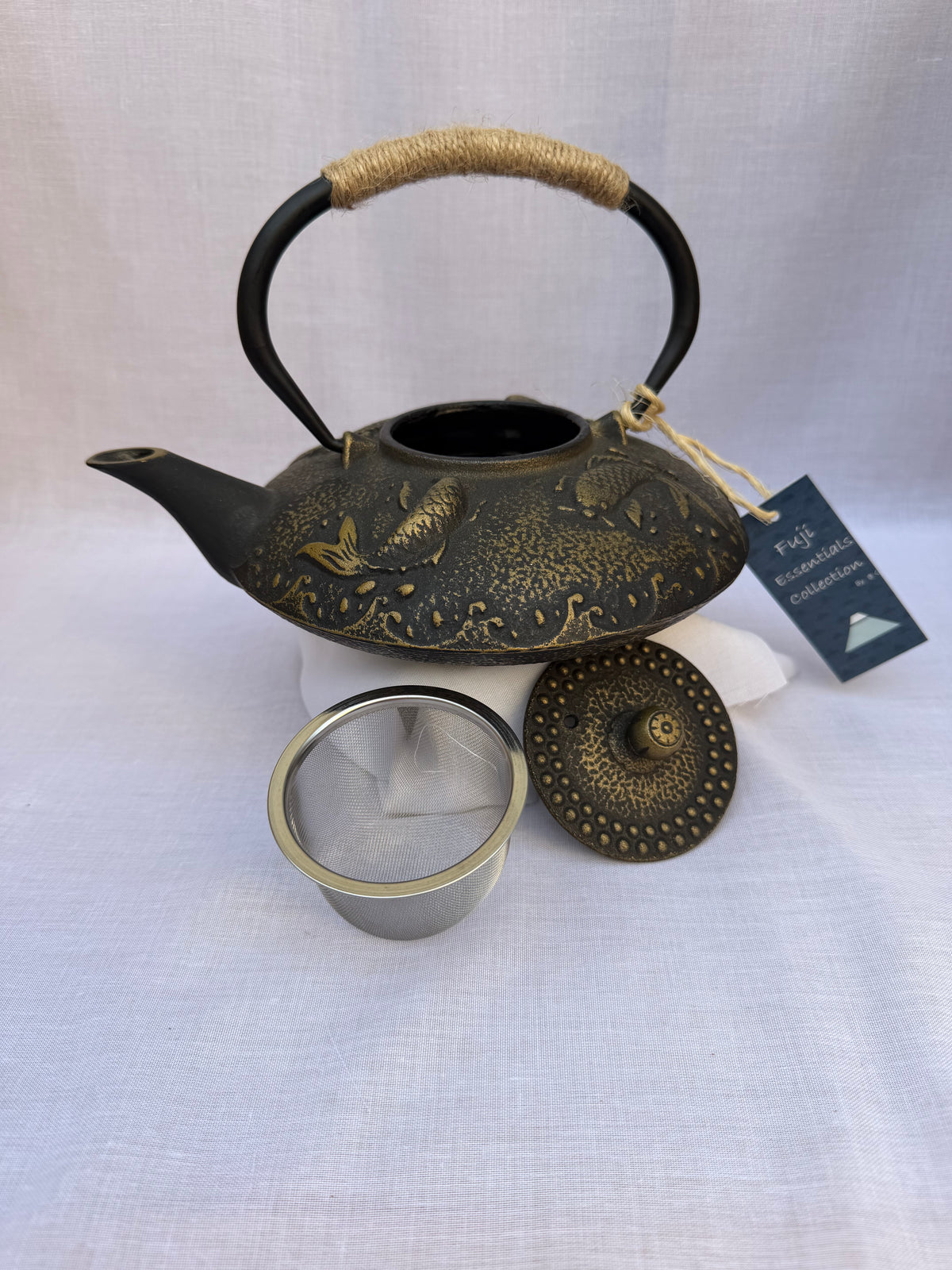 Théière en fonte Poisson